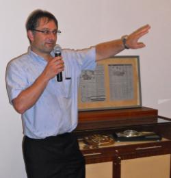 Exhibit organizer Yuri Gaspar talks to audience at Saturday's preview. Exhibit organizer Yuri Gaspar talks to audience at Saturday's preview.